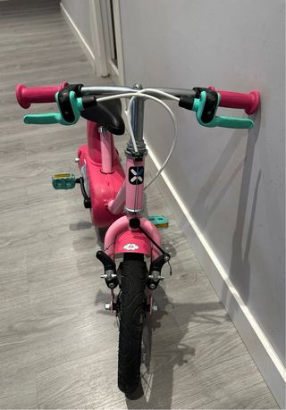 Bicicleta Btwin niña rosa unicornios