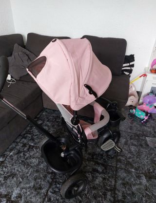 Triciclo bebé rosa con capota