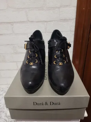 Zapato de piel negro