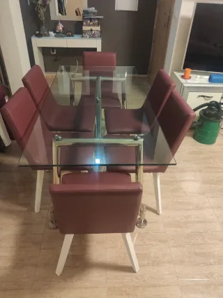 Mesa de cristal con 6 sillas granate