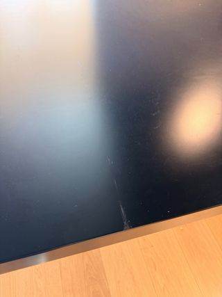 Mesa de comedor negra de madera