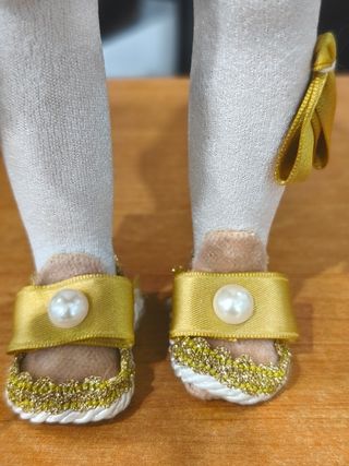 Bambola da collezione in porcellana L'Infinito.