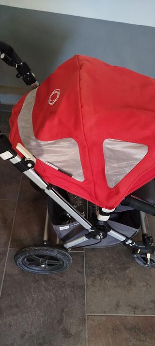 Carrito Bugaboo con saco invierno y sombrilla