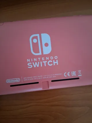 Nintendo Switch Lite Rosa + 2 Giochi