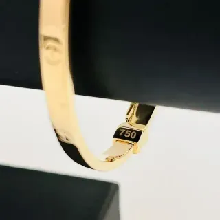 PULSERA TIPO CARTIER RIGIDA TORNILLO.Hueca.Oro 18k