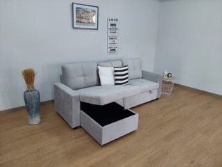 Sofá cama gris de tela con rinconera y arcon nuevo