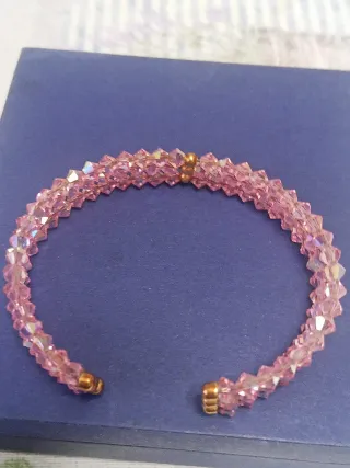 Bracciale rigido Swarovski oro 18 ct e cristalli