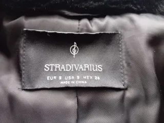 Cazadora negra pelo sintético talla S