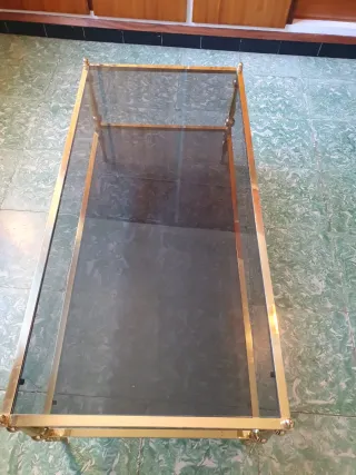 Mesita auxiliar cristal y metal dorado