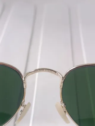Gafas de sol Ray-Ban doradas y verdes