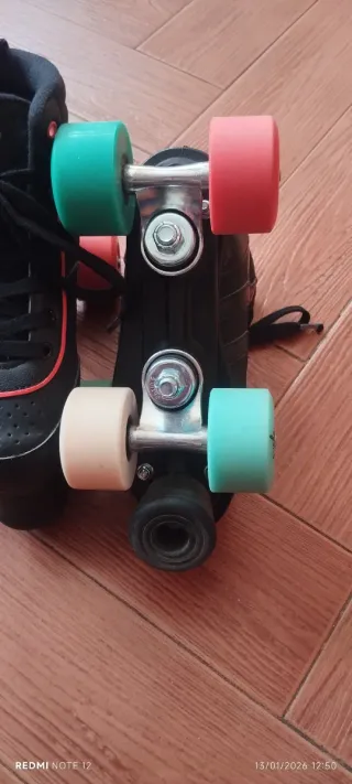 Patines Oxelo negros con ruedas de colores t 34.