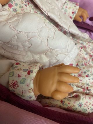 Carrito de muñecas con muñeca bebé