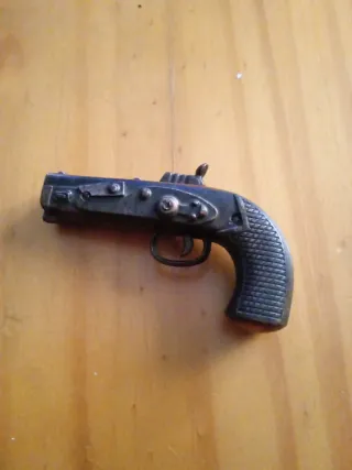 Sacapuntas antiguo pistola calamina