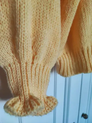 Chaqueta de punto mangas abullonadas.