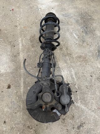 Amortiguador con buje y pinzas de freno