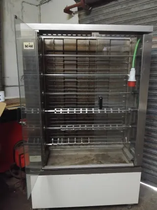 Maquina de pollos a l'ast 6 espadas nueva