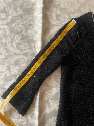 Chaqueta negra lentejuelas adornos plateados