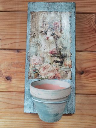 Suporte de parede para vasos