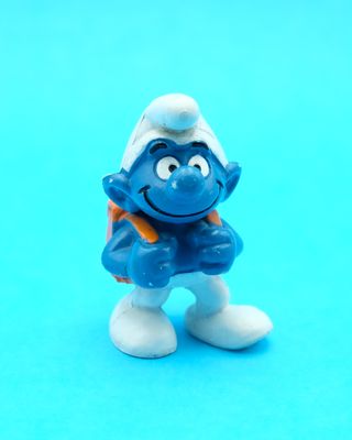 Figura PVC Pitufo estudiante con mochila