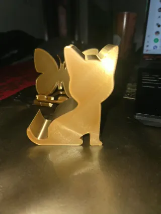 Sujeta móvil gato y mariposa dorado