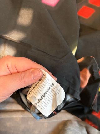 Copripiumone Ikea nero con quadretti neon