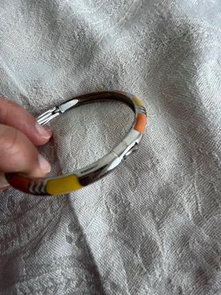 Bracciale rigido metallo arancio giallo