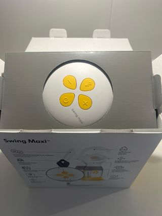 Sacaleches Medela Swing Maxi Doble y Calentador