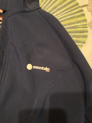 Chaqueta trekking Mountain azul y rosa