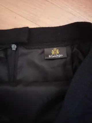 Lote conjunto Falda mini negra y blusa plumeti