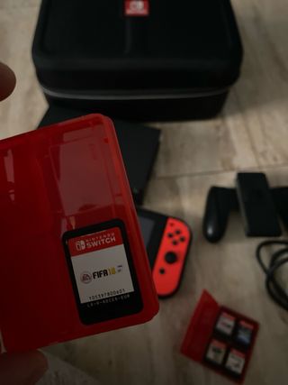 Lote Nintendo Switch + funda + juegos