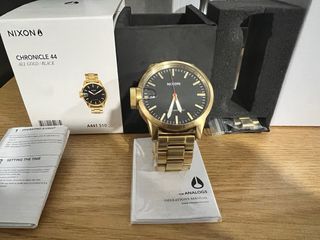 Reloj Nixon Chronicle 44 OroyNegro , estado perfet