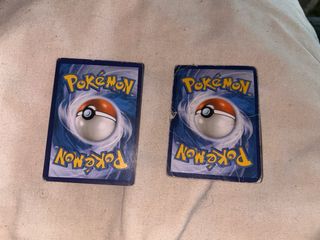 Cartas Pokémon Mewtwo GX y Charizard EX
