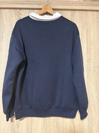 Sudadera azul cuello polo New York