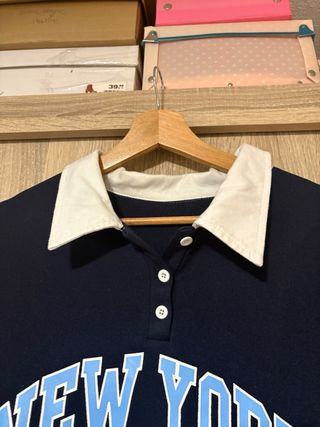 Sudadera azul cuello polo New York