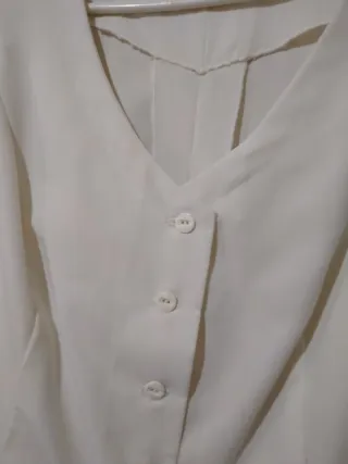 Conjunto de chaleco y pantalón beige mujer