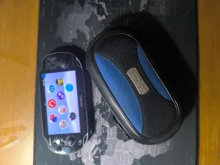 PS Vita OLED (Modelo 1000) + Funda + 4 Juegos