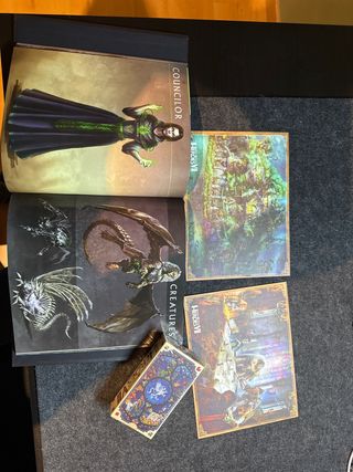 Libro y cartas Might & Magic Heroes VII