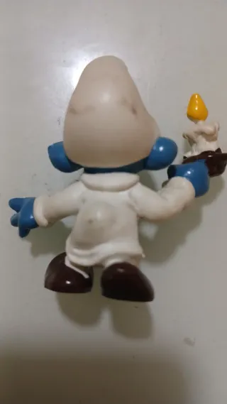 Puffo sonnambulo con candela