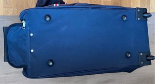 Bolsa de viaje azul con ruedas