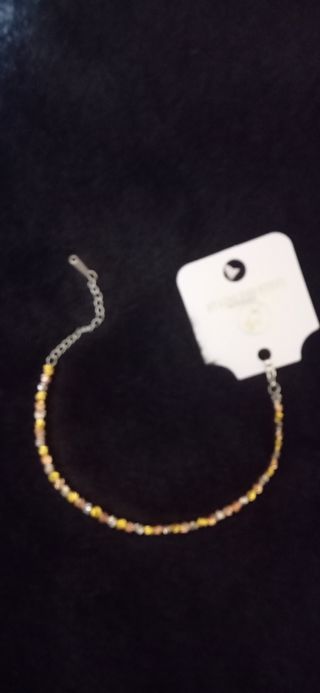 Bracciale luminoso oro, argento e rosa