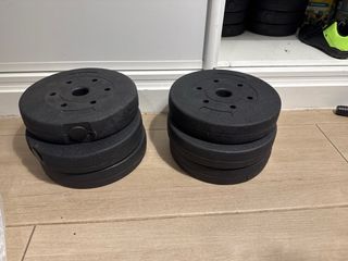 Juego de pesas negro con varios accesorios