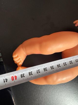 Muñeca bebé rubia ojos azules