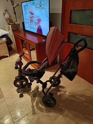 Triciclo infantil rosa poco uso, marca lionelo