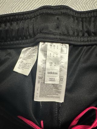 Tuta Adidas mezza zip nera e fucsia