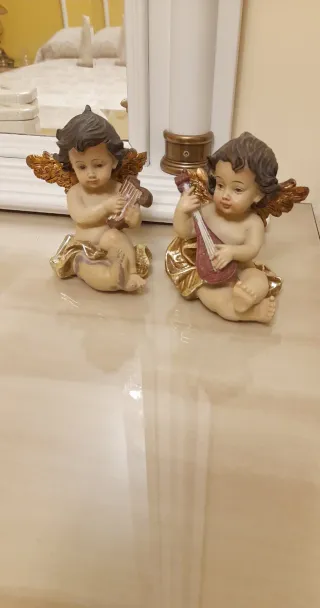 Figuras de angeles con Instrumentos Musicales