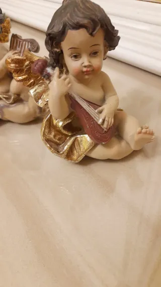 Figuras de angeles con Instrumentos Musicales