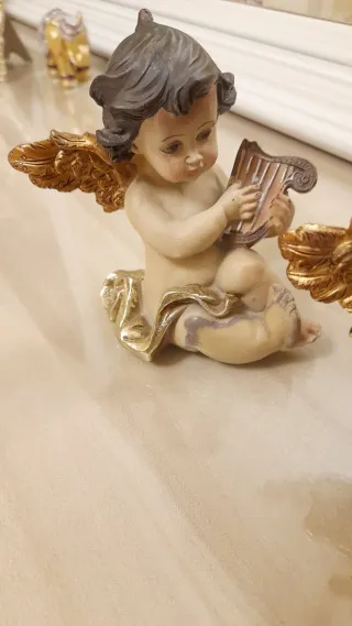 Figuras de angeles con Instrumentos Musicales