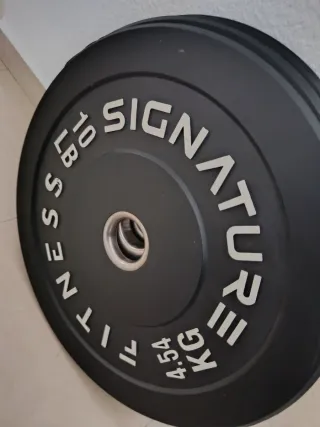 4 Pesas para barra, 2x 6,80kg y 2 x4,54kg