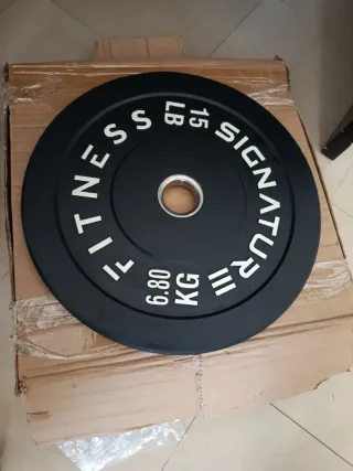 4 Pesas para barra, 2x 6,80kg y 2 x4,54kg