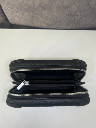Louis Vuitton Horizon Clutch Negro